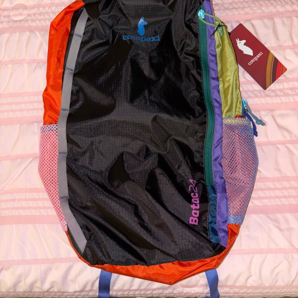 Cotopaxi Batac 24L Backpack in Black, Red, and Purple